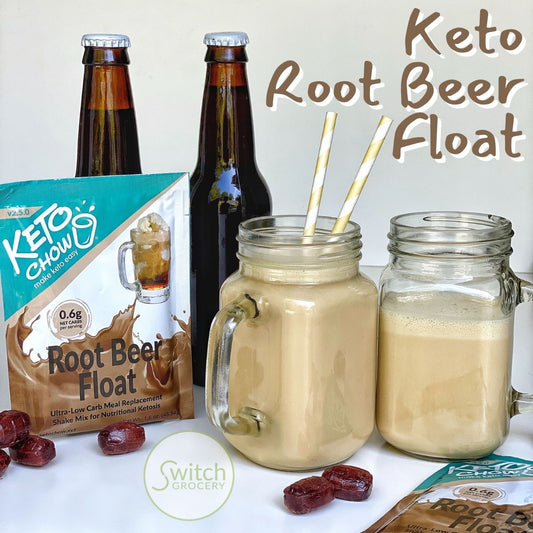 two mugs full of keto root beer float with a keto chow packet and two beer bottles.